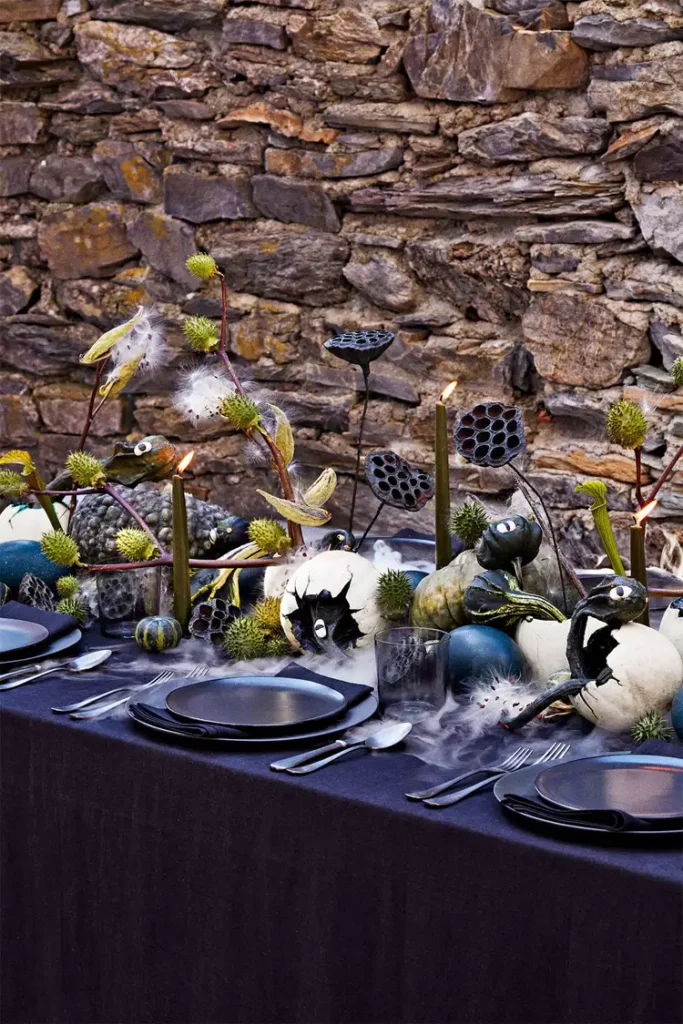 12 Stunning Halloween Florals to Inspire a Spooky Event / Black lotus pod centerpiece