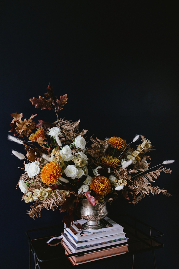 12 Stunning Halloween Florals to Inspire a Spooky Event / Dried floral arrangement orange and white flowers